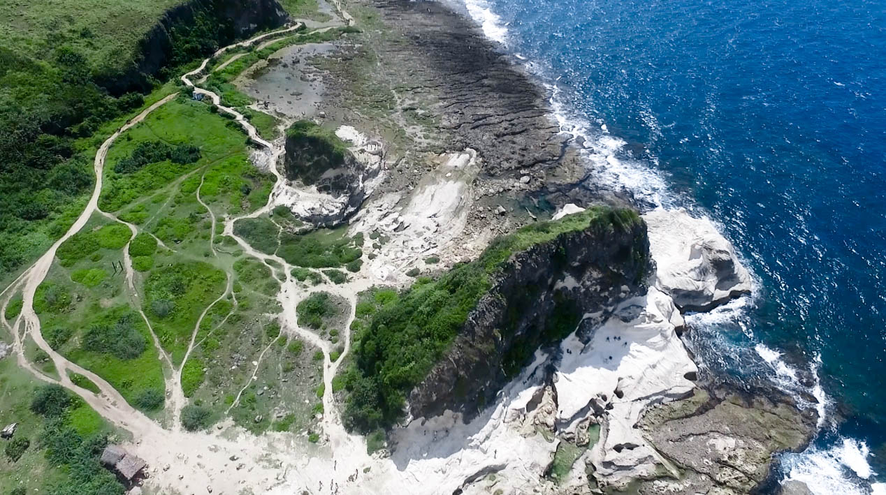 high drone shot of the kapurpurawan rock formation in burgos ilocos norte philippines
